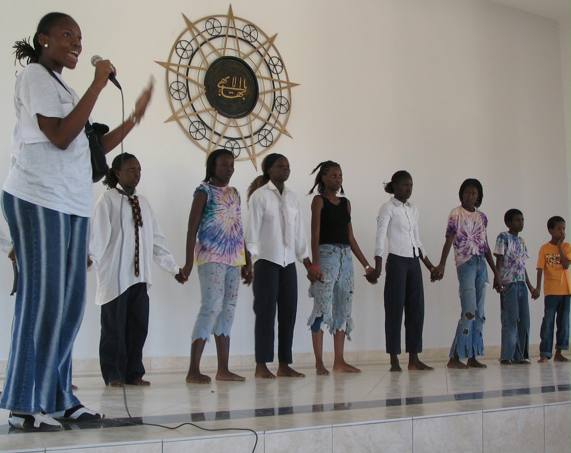 Les Etincelles, a Baha'i dance troupe from Dakar, Senegal, performing at the opening of the new Baha'i center in Bakau, The Gambia.
