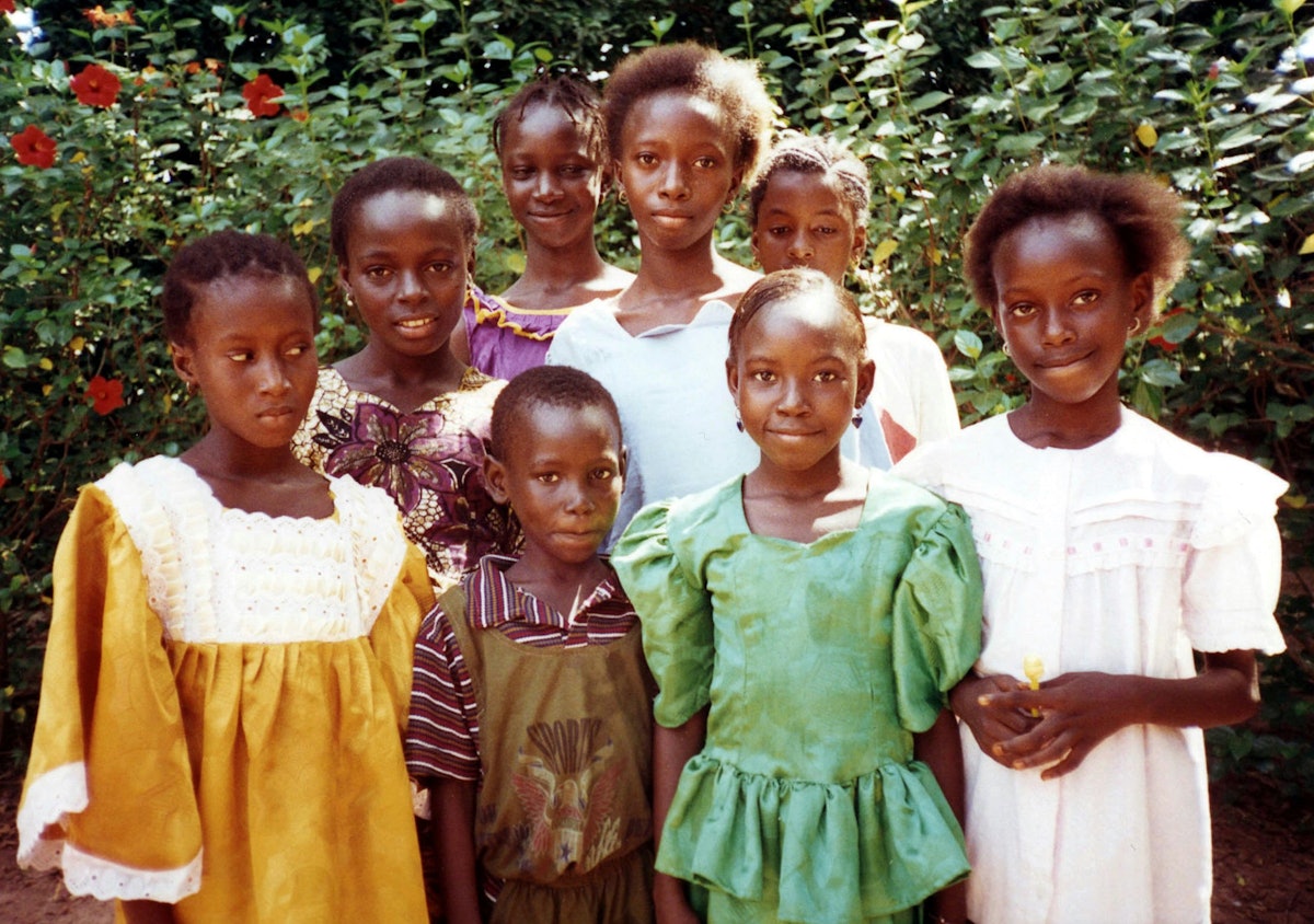 Members of a Baha'i children's class in Lamin village, The Gambia, celebrating the anniversary of the birth of Baha'u'llah. 1997.