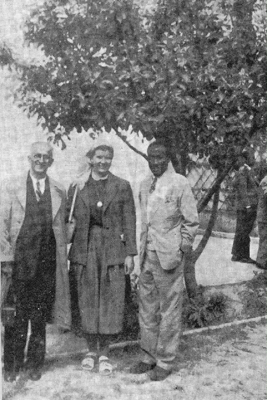 The person who introduced the Baha'i Faith to The Gambia, Fariborz Ruzbehyan, (left) is pictured with the first Gambian Baha'i, Nelson Ethan Thomas (right), and Mavis Nymon, who brought the Faith to Togo. 1956.