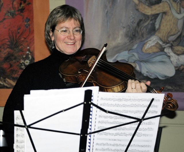 In Edinburgh's St. George's West Church, where Dr. Alexander Whyte once preached, viola player Carolyn Sparey-Fox entertained participants in the events marking the anniversary of the 1913 visit of Abdu'l-Baha.
