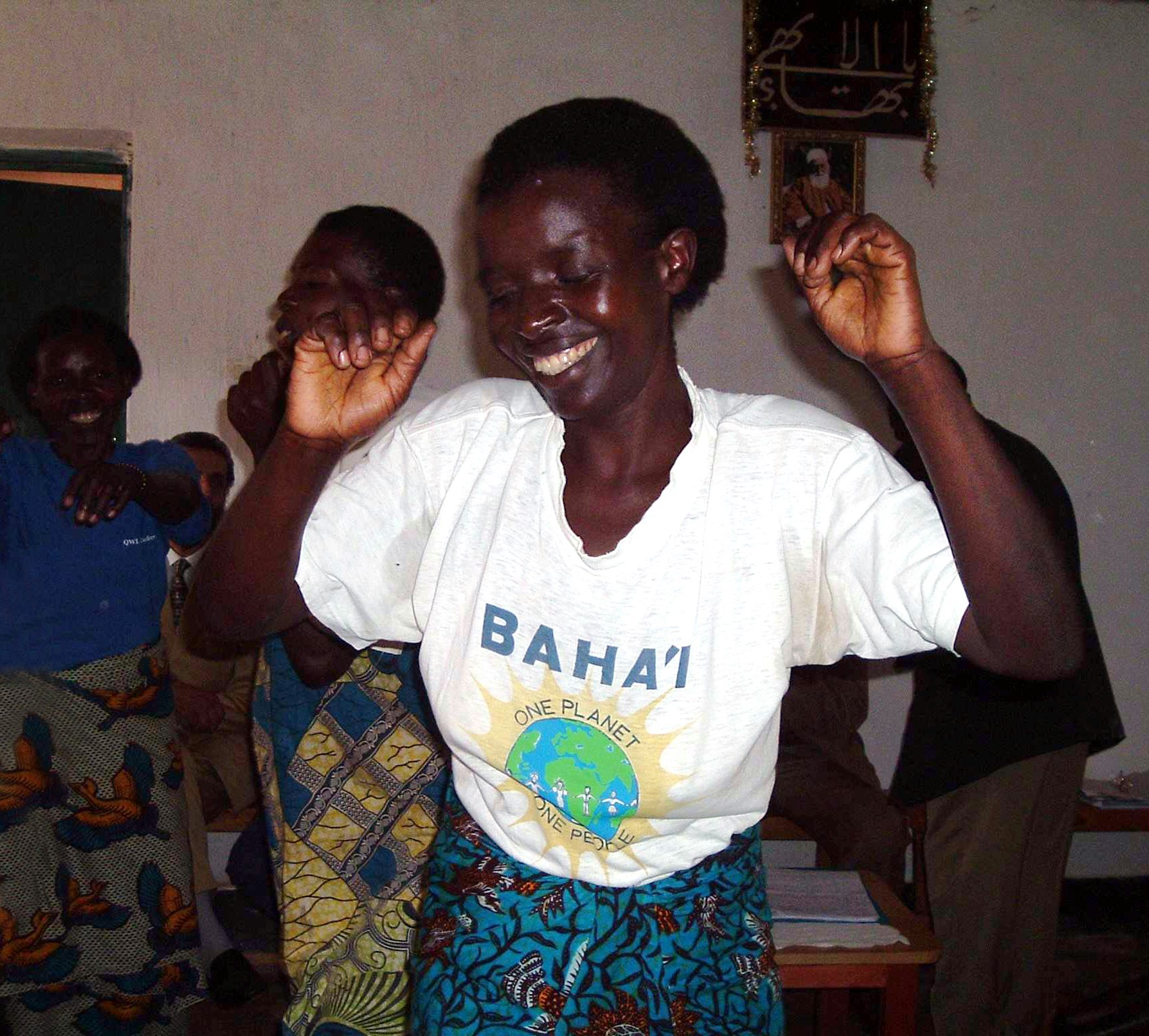 Joy in action...a member of the Nyagisagara Baha'i choir at the jubilee celebrations of the Baha'i community of Rwanda.