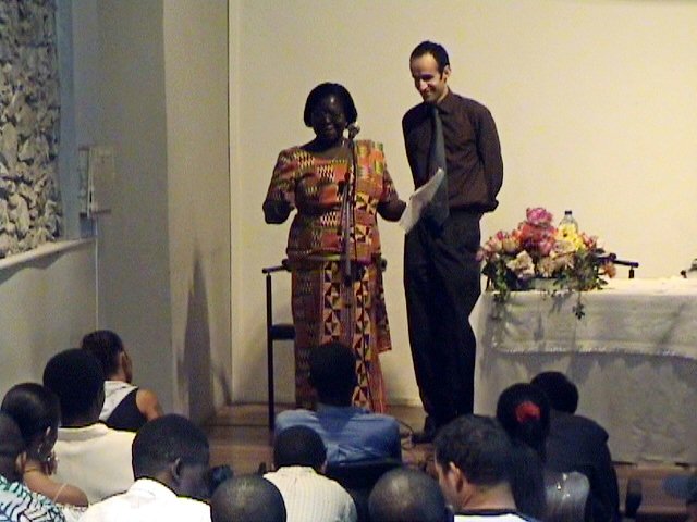 A member of the Continental Board of Counsellors in Africa, Beatrice Asare, with a representative of the Baha'i community of Portugal, Varqa Carlos Jalali, at the Cape Verde Baha'i jubilee festivities.