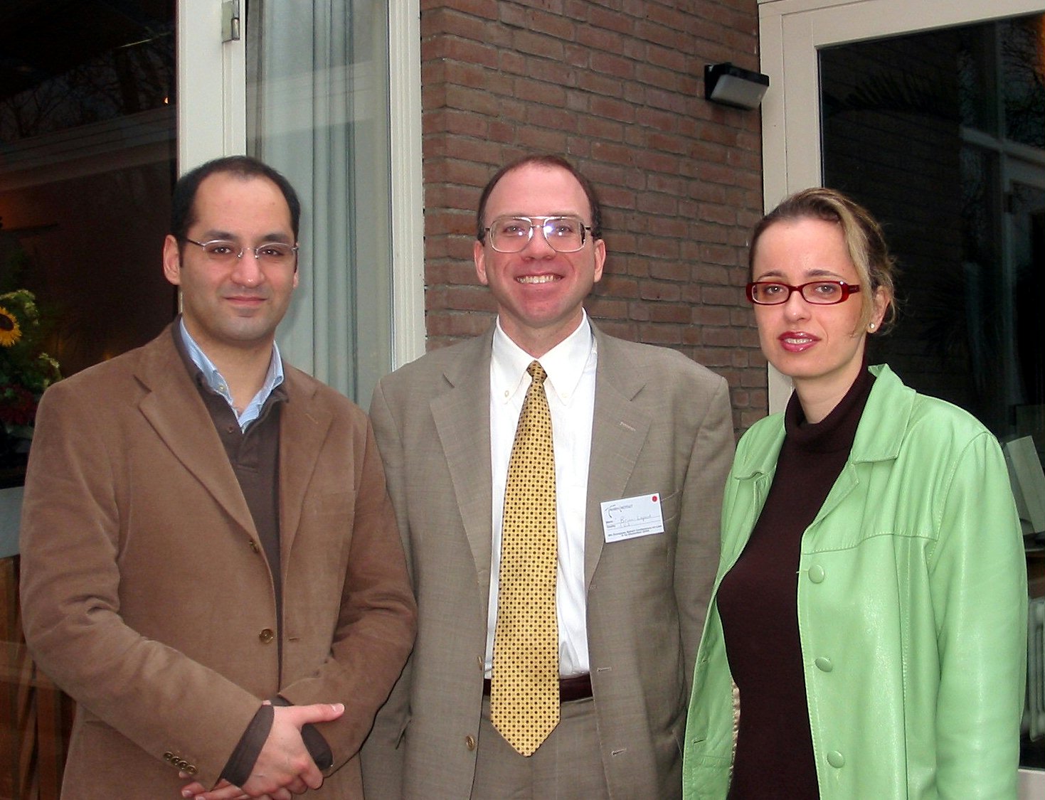 Keynote speaker Professor Brian Lepard (center) with Rod Rastan and Ariane Sabet at the European Baha'i Conference on Law.