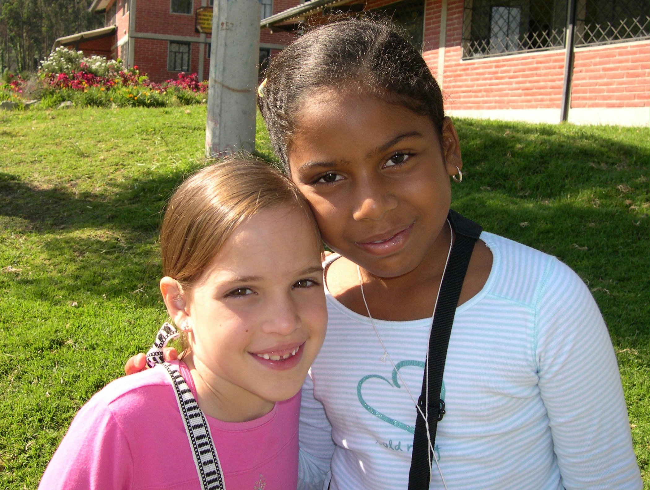 Friends together at the "Growth and Victories" conference in Ecuador, Janai Molineaux, left, and María Fernanda Rodriguez, both of Colombia.