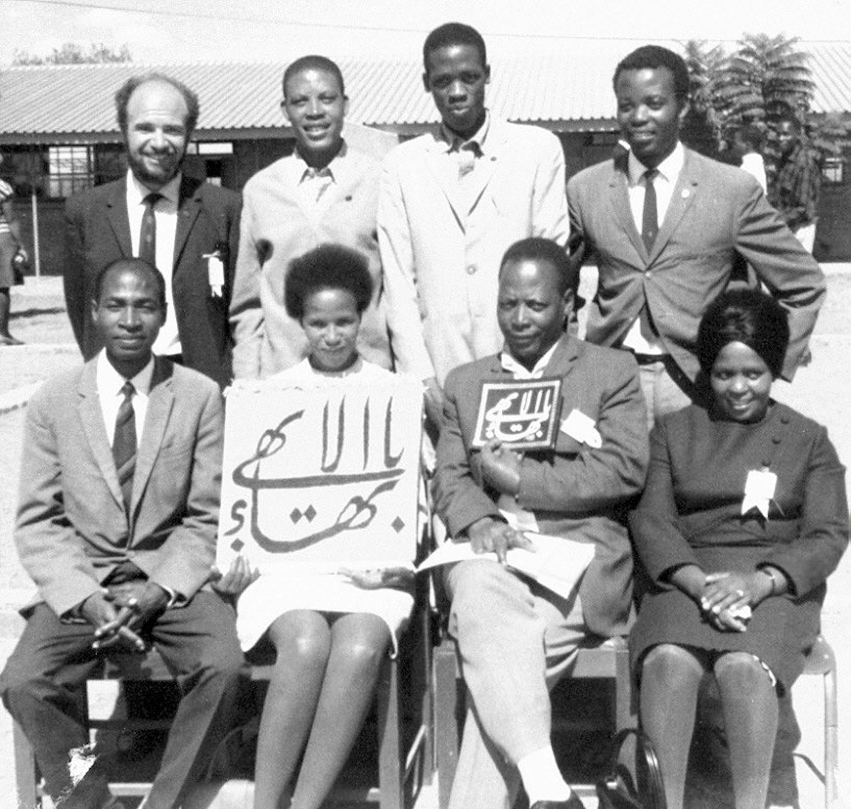 Eight members of the first National Spiritual Assembly of the Baha'is of Botswana, 1970.