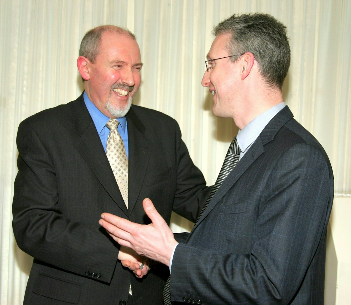 The secretary of the National Spiritual Assembly of the Baha'is of the United Kingdom, the Hon. Barney Leith (left), with the chair of the All Party Parliamentary Friends of the Baha'i Faith, Mr. Lembit Opik MP.