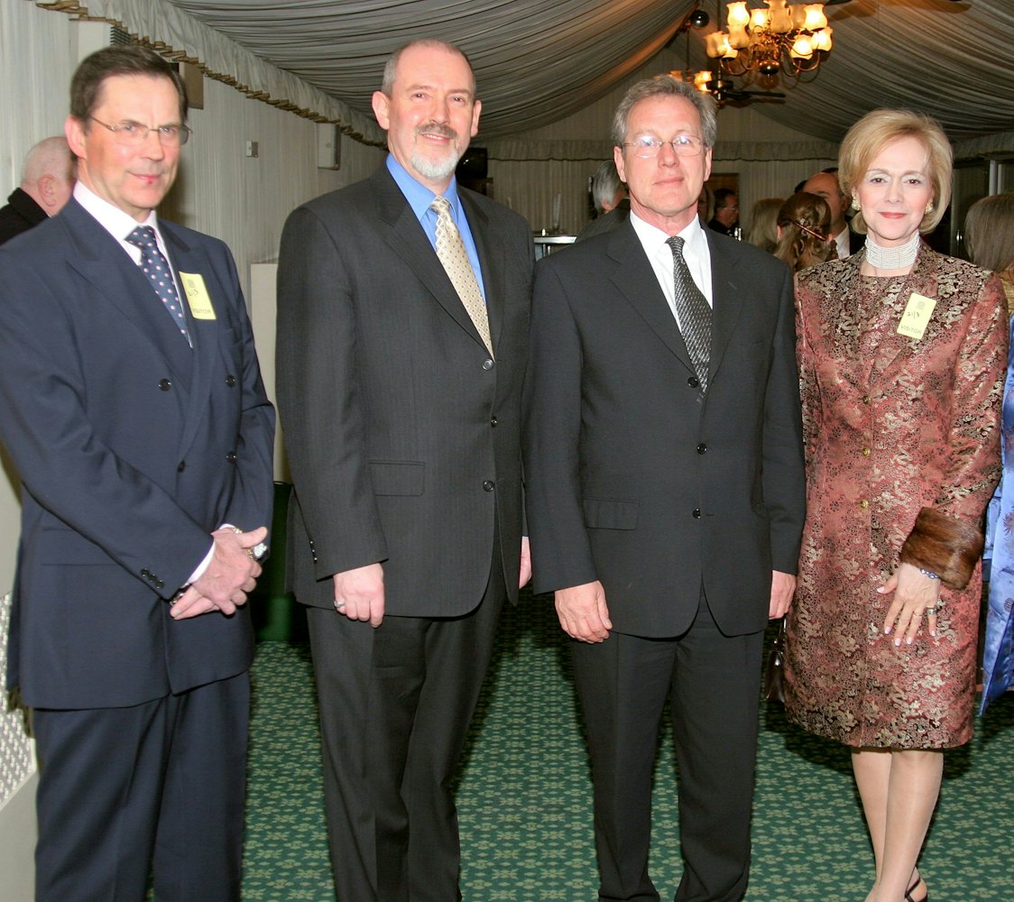 Lord Andrew Stone (third from left) at the Baha'i Naw-Ruz reception at the British Parliament with Baha'i representatives (left to right) Dr. Graham Walker, the Hon. Barney Leith, and Ms. Guilda Walker.