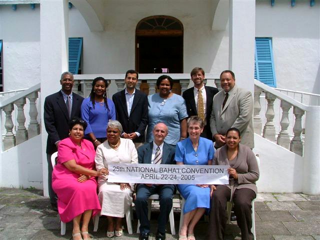 Members of the National Spiritual Assembly of the Baha'is of Bermuda elected in 2005, with guests Abdul-Missagh Ghadirian, a member of the Continental Board of Counsellors in the Americas, (front, center), and William Roberts, a member of the National Spiritual Assembly of the Baha'is of the United States (rear,right.)