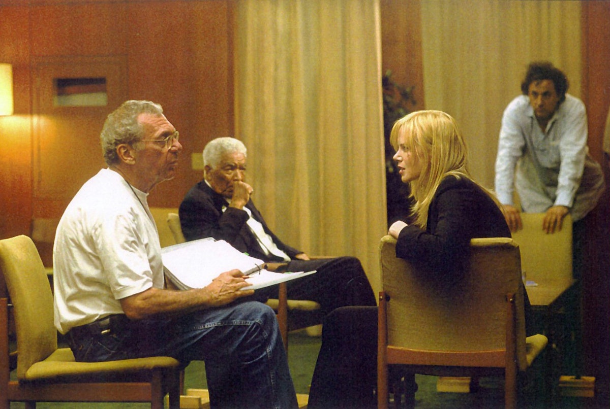 Earl Cameron (second from left) in a discussion during the filming of "The Interpreter" with Oscar-winning director Sydney Pollack and actor Nicole Kidman. Photo courtesy of Universal Studios.