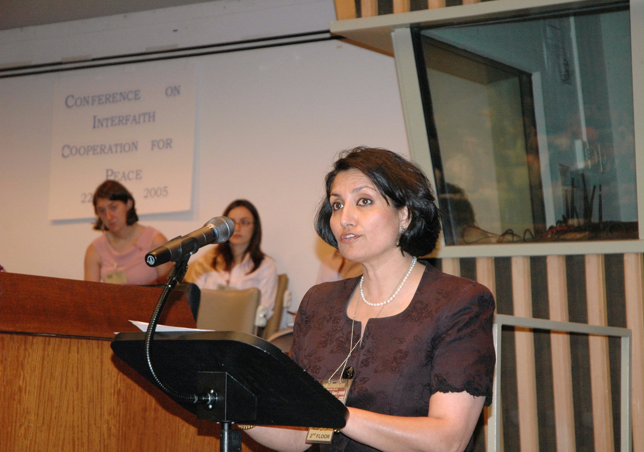 The Baha'i International Community's principal representative to the United Nations, Bani Dugal, addressing the interfaith conference.