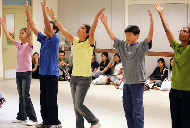 Baha'i junior youth dancers from a variety of backgrounds won applause from an audience of more than 500 youth at an event organized in Singapore by the World Bank.