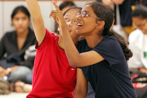 Pointing to a united future -- dancers in the Singaporean Baha'i junior youth dance troupe performing at an event for youth organised by the World Bank.