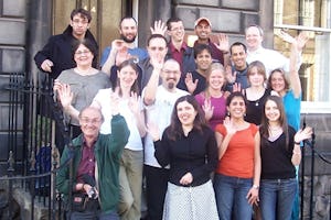 Some local Baha'is at the entrance to the new Baha'i center in Edinburgh.