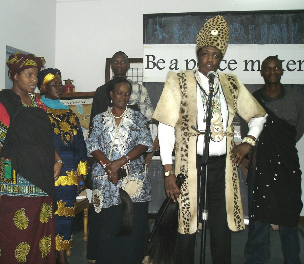 Chief Matange (second from right) and other members of an African traditional religion during prayers at the International Day of Peace gathering organized by the Baha'i community of Tanzania.