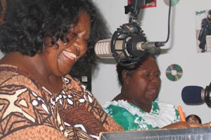 Janelle Gebadi (left) and Ina Aiputa presenting their weekly Baha'i-inspired radio program.