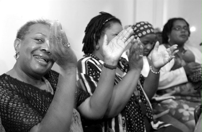 Inspirational prayers, music, and readings create an uplifting atmosphere at the Hush Harbor devotional meetings in the New York Baha'i Center.