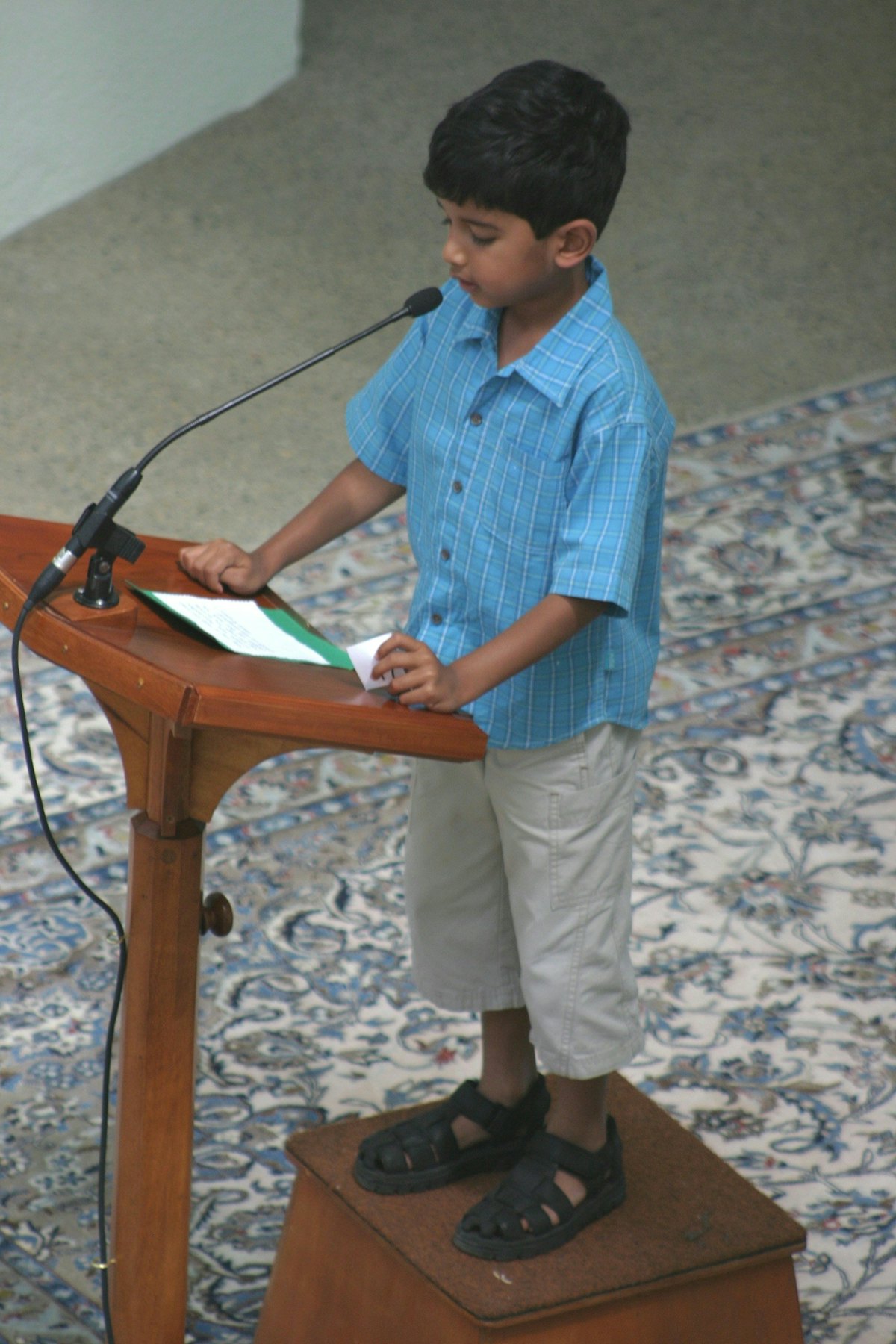 Varun Rao reads a prayer at the children's service at the Baha'i House of Worship in Sydney.