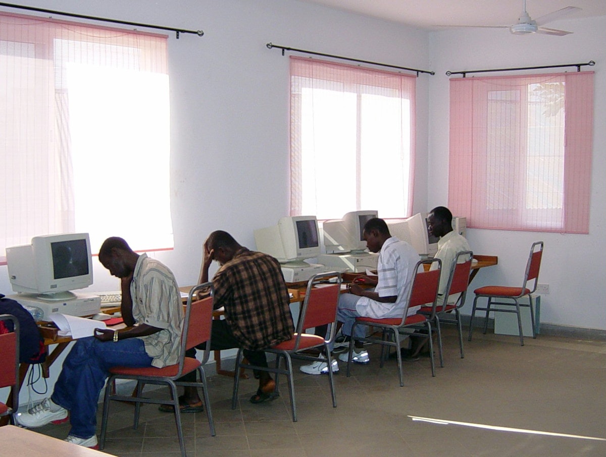 Participants in the advanced computer course organized by the Baha'is of The Gambia using donated machines at the Baha'i center, where the courses are held.