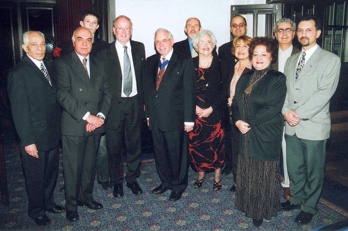 Sir Sydney Chapman (fourth from left) and Barnet Deputy Mayor Victor Lyon and Mrs. Lyon (fifth and seventh from left) with others at the award ceremony.