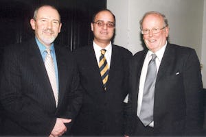 Blomfield Award recipient Sir Sydney Chapman, right, with Baha'i representatives, the Hon. Barney Leith (left) and Dr. Kishan Manocha.