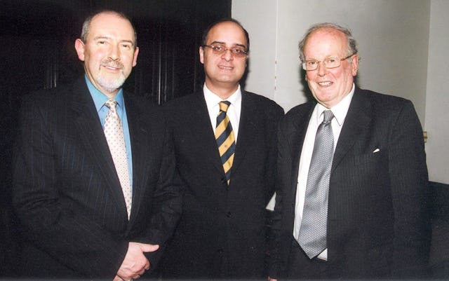 Blomfield Award recipient Sir Sydney Chapman, right, with Baha'i representatives, the Hon. Barney Leith (left) and Dr. Kishan Manocha.