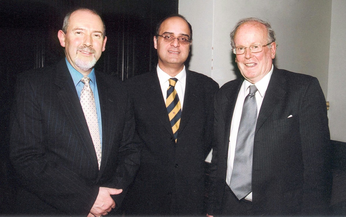 Blomfield Award recipient Sir Sydney Chapman, right, with Baha'i representatives, the Hon. Barney Leith (left) and Dr. Kishan Manocha.