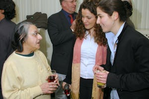 Phiroza Gan (left) of the Zoroastrian community in conversation with Noemi Robiati (right) and another Baha'i youth at a Naw-Ruz celebration in the House of Commons on 21 March 2006.