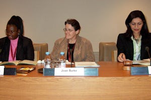 Letty Chiwara, Joan Burke, and Fulya Vekiloglu, left to right, on 8 September 2006 at the United Nations. Ms. Chiware is a program specialist with the Africa section of the United Nations Fund for Women (UNIFEM), Ms. Burke is a Catholic nun who lived and worked in various countries in Africa for 20 years, and Ms. Vekiloglu is a representative of the Baha'i International Community to the United Nations.
