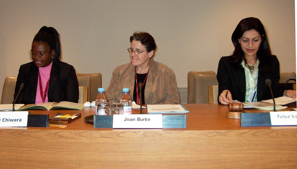 Letty Chiwara, Joan Burke, and Fulya Vekiloglu, left to right, on 8 September 2006 at the United Nations. Ms. Chiware is a program specialist with the Africa section of the United Nations Fund for Women (UNIFEM), Ms. Burke is a Catholic nun who lived and worked in various countries in Africa for 20 years, and Ms. Vekiloglu is a representative of the Baha'i International Community to the United Nations.