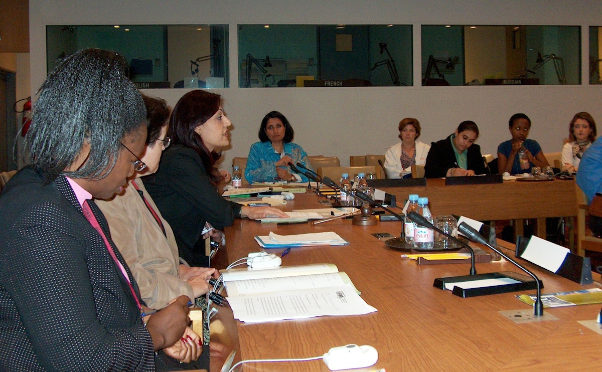 "Beyond Violence Prevention: Creating a Culture to Enable Women's Security and Development," a panel discussion at the United Nations on 8 September 2006, was hosted by the Baha'i International Community and the International Presentation Association. It was held as part of the 59th Annual United Nations Department of Public Information/Non-Governmental Organization conference. Closest to the camera is Letty Chiwara, a program specialist with the Africa section of the United Nations Fund for Women (UNIFEM). To her left is Joan Burke. Fulya Vekiloglu of the Community, leaning forward, was the panel's moderator.