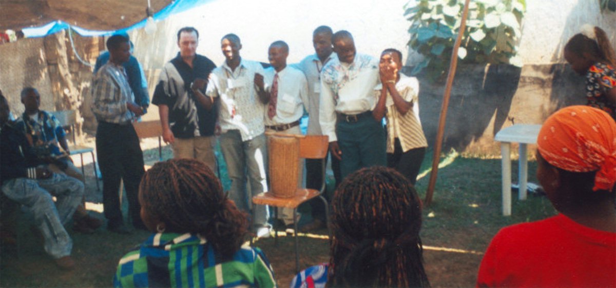 Young people make a presentation about activities they plan to do after returning to home.