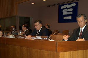 Members of the opening panel at the UN Conference on Interfaith Cooperation for Peace on 21 September 2006 include, from left, Hiro Sakurai of the Committee of Religious NGOs at the UN; Ali Hachani of the UN Economic and Social Council; Alberto G. Romulo, foreign affairs secretary of the Philippines; and Abdoulaye Wade, president of Senegal.