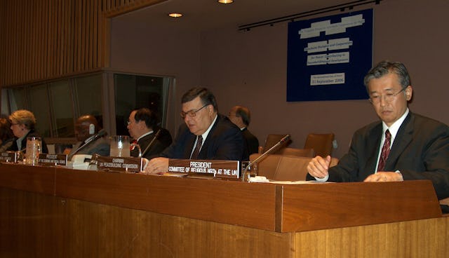 Members of the opening panel at the UN Conference on Interfaith Cooperation for Peace on 21 September 2006 include, from left, Hiro Sakurai of the Committee of Religious NGOs at the UN; Ali Hachani of the UN Economic and Social Council; Alberto G. Romulo, foreign affairs secretary of the Philippines; and Abdoulaye Wade, president of Senegal.
