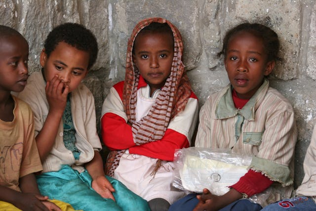 A group of children waiting to join an activity. (Photograph by Ryan Lash)