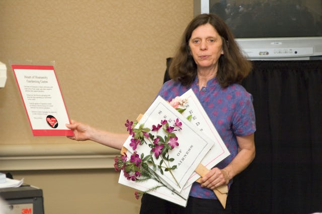 Workshop participant Susan Tower outlines the Heart of Humanity Gardening Game she has used at various events in the Columbus, Ohio, area.