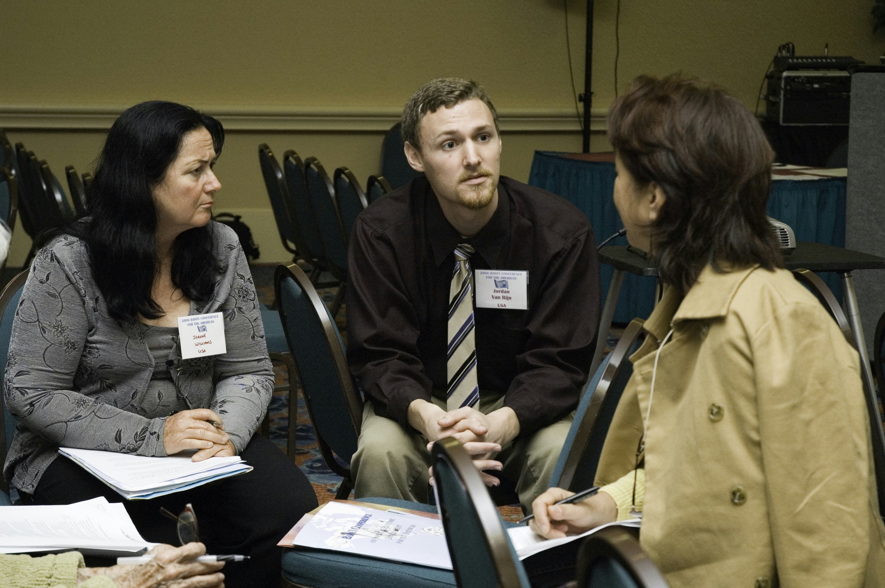 Presenter Jordan van Rijn, center, listens as participants discuss concepts of sustainability during his workshop on grassroots community banking in Nicaragua.