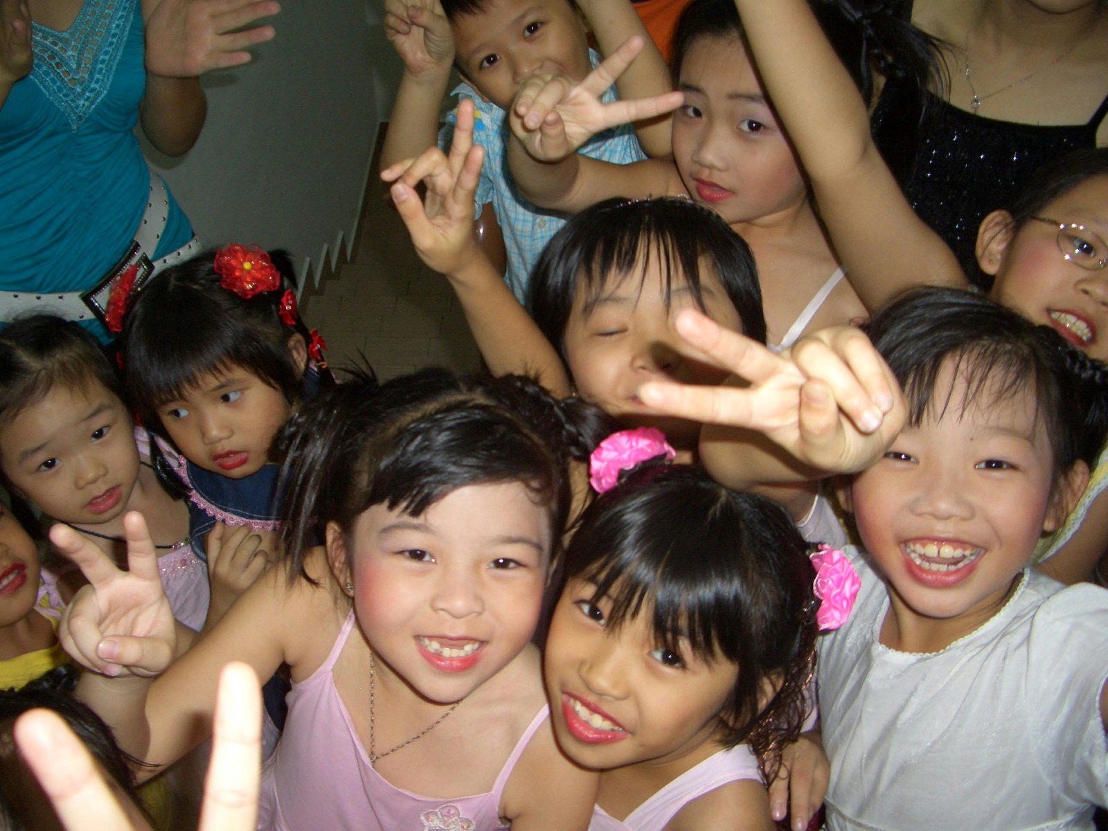 Children in Jenjarom get ready to make a presentation on a series of virtues they had studied in one of the classes sponsored by the local Baha'i community.
