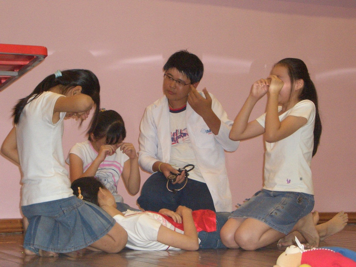 Junior youth perform a skit called "Mom, I love you," which illustrates the virtues of obedience to one's parents.