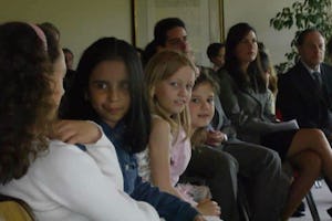 Children and adults gather for a Ridvan program near the Baha'i house of worship outside Frankfurt, Germany. The Festival of Ridvan lasts 12 days, with most countries holding special events on the first, ninth and 12th days of the period.
