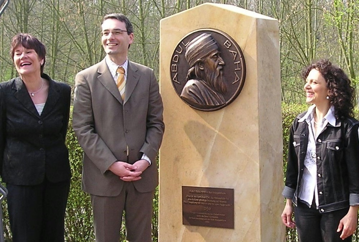 The new memorial to the visit of 'Abdu'l-Baha to Bad Mergentheim, Germany, was unveiled on 7 April 2007. At the ceremony, from left, are resort-director Katrin Lobbecke, Mayor of Bad Mergentheim Lothar Barth, and Sussan Rastani, a member of the Baha'i community of Bad Mergentheim.