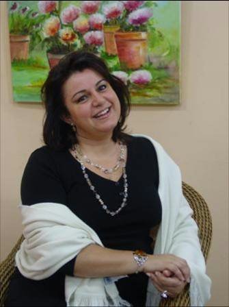 Video: Shideh Granfar interviews a guest on her weekly TV show in Blumenau, Brazil. On the air more than a decade, she believes her upbeat attitude - a reflection of her religious belief - is key to the show's success.