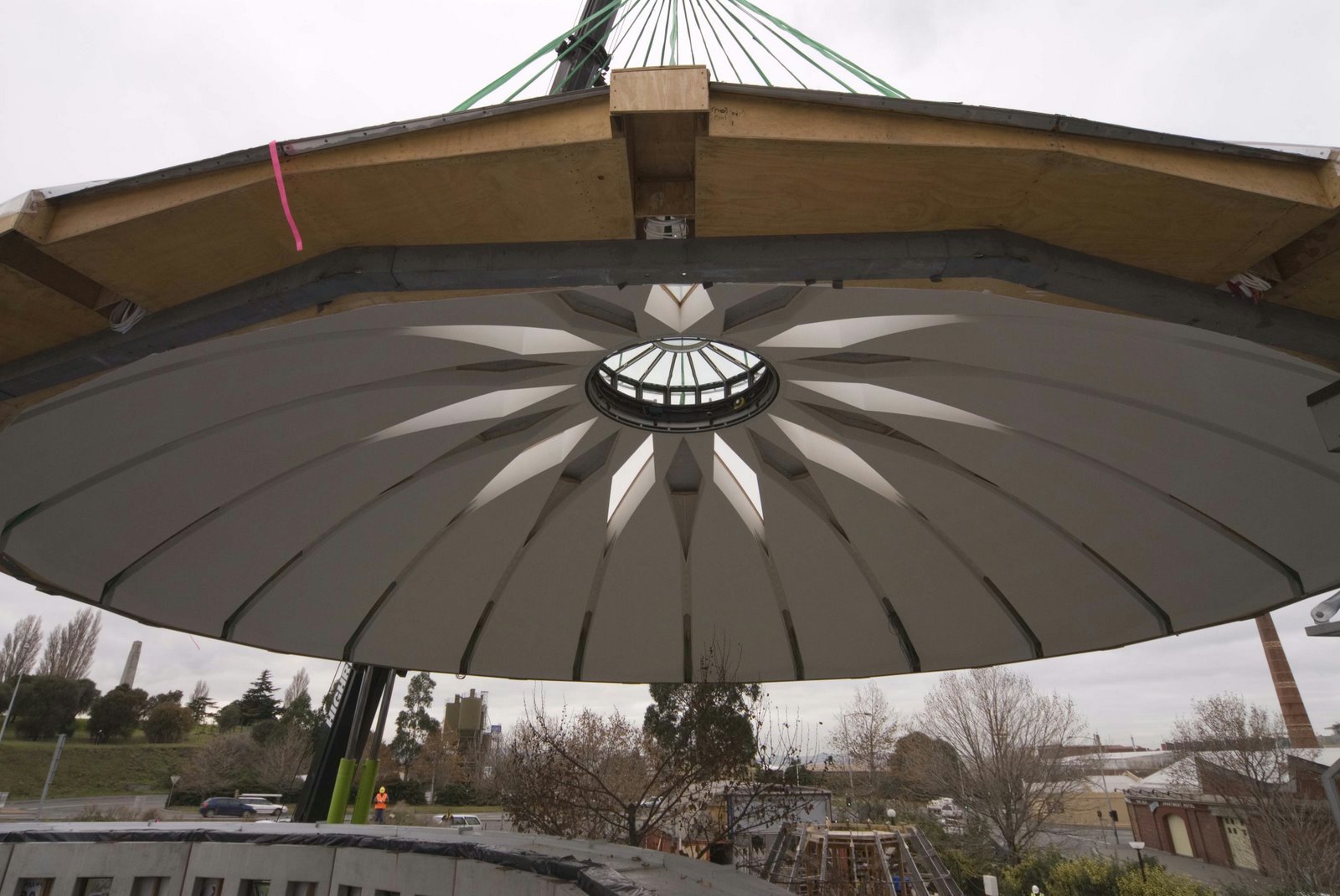 The dome of the new Baha'i Center of Learning in Tasmania is lowered into place. The design of the structure symbolizes unity and was created with environmental factors as a high priority. The dome was put in place on 9 July.