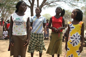 Young teens join to recite a poem at the launch on 6 October of 38 new "junior youth" groups in Sinazongwe District in southern Zambia.