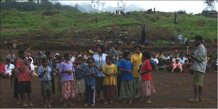 Children of Bunisi and environs no longer have to walk two hours down a mountain to attend first and second grade. Older children continue to make the hike.