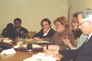 Panel members at a U.N. discussion about violence against women include, from left, Michael L. Penn, Fabien Fieschi, moderator Carolyn Hannan, Hedda Samson, and Mike Wessells.