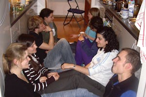 A dozen people gather every two weeks at a home in Heidelberg, Germany, for prayers, food, and conversation. Participants say they like the relaxed atmosphere.