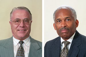 Mr. Hartmut Grossmann, left, and Mr. Glenford E. Mitchell.
