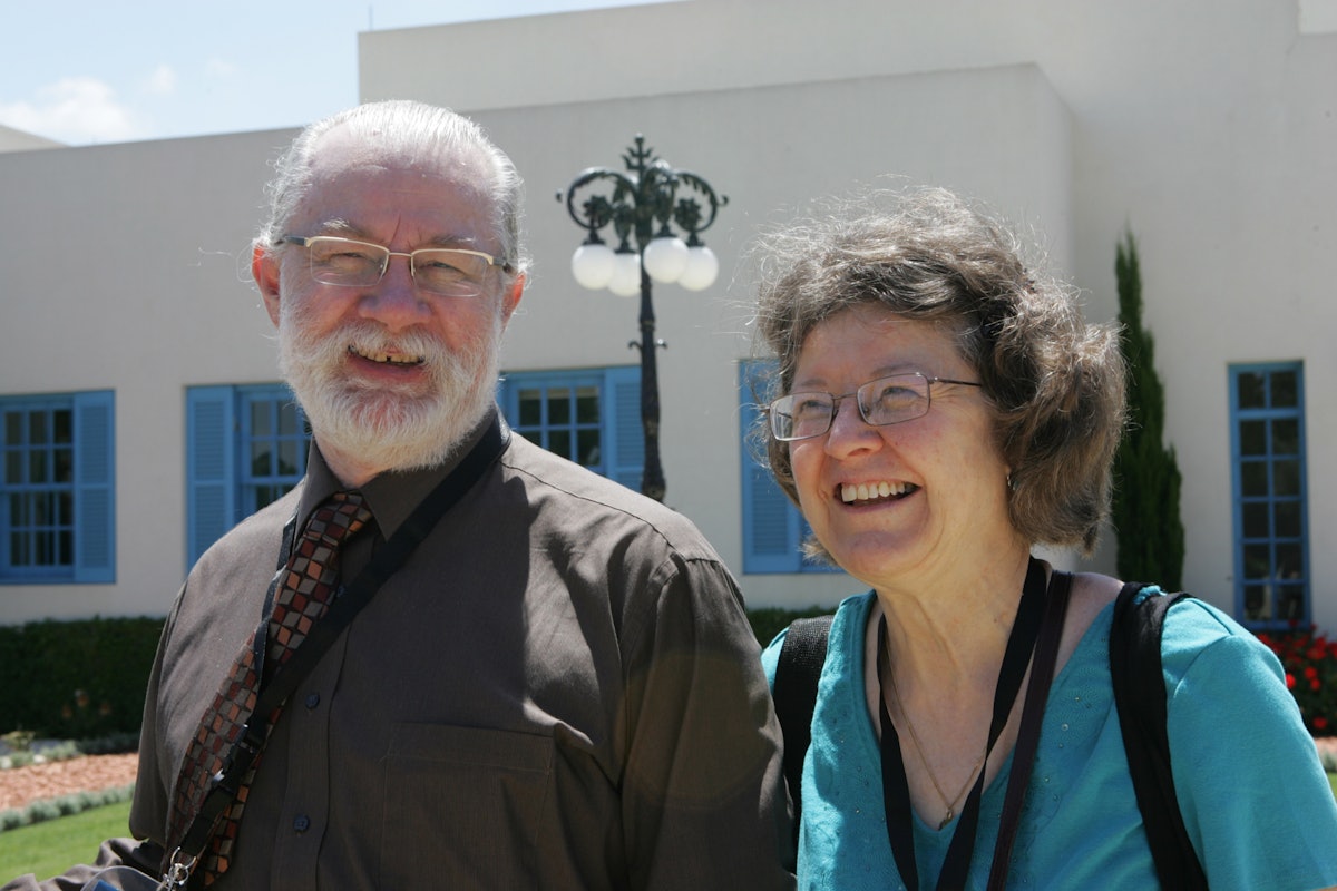 A couple from Greenland leave the visitors' center at Bahji near Acre in northern Israel. Delegates to the convention go there to the Shrine of Baha'u'llah for personal prayer before casting ballots on 29 April for the members of the Universal House of Justice.