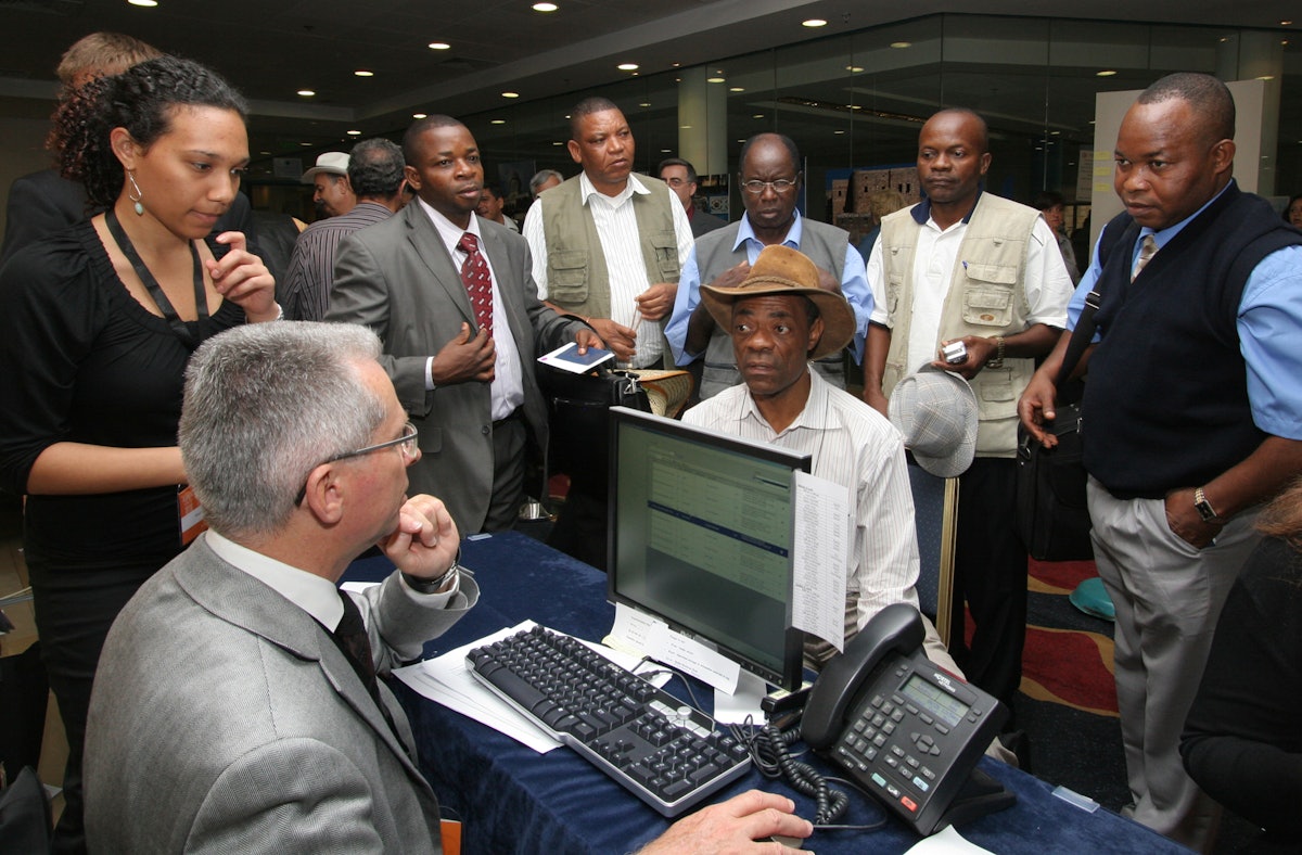 Members of the National Spiritual Assembly of the Democratic Republic of the Congo register on 26 April for the International Baha'i Convention in Haifa, Israel.