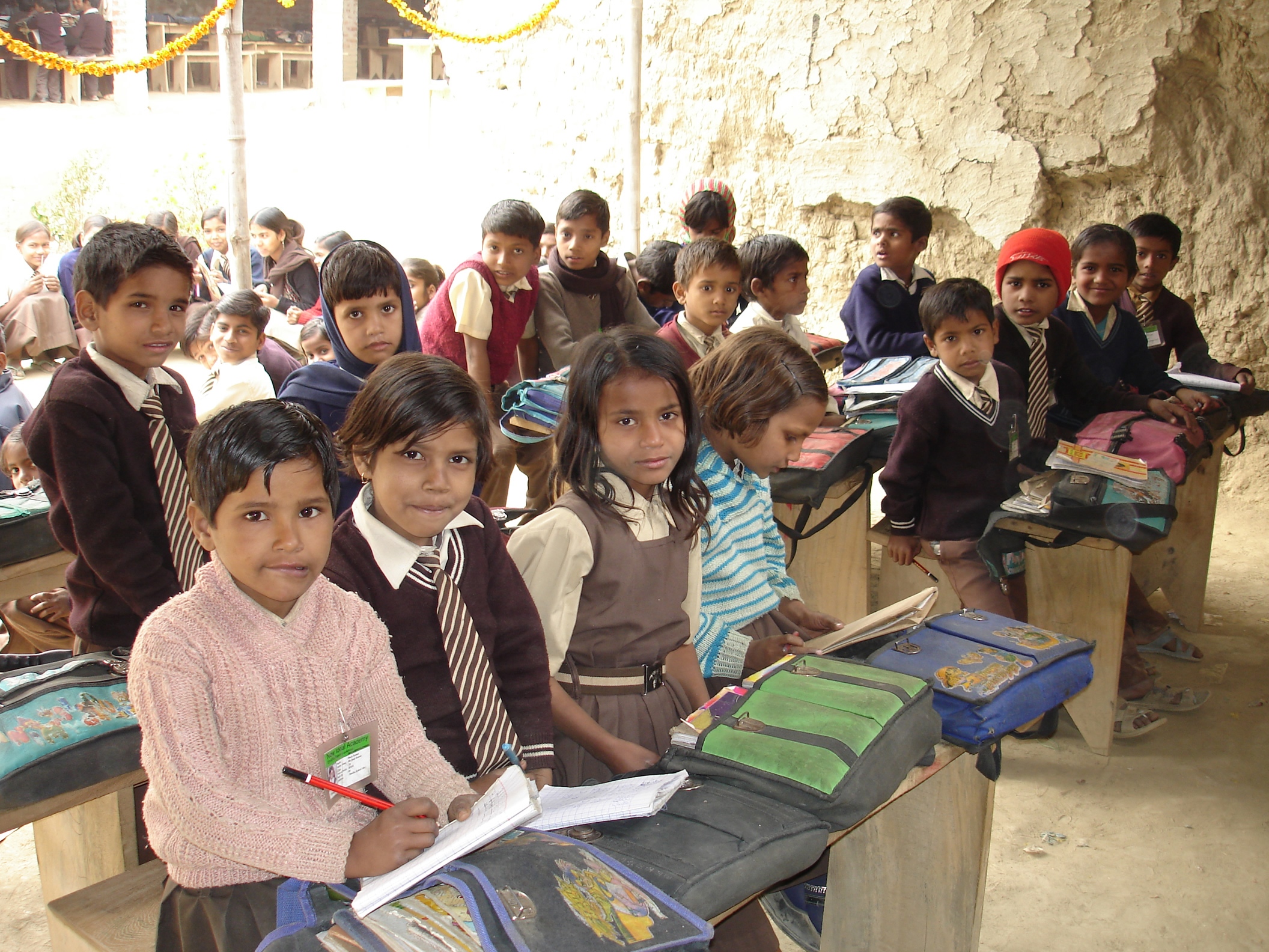 In most of the community schools, villagers help, often by providing land or furniture for the school itself. This class is at New Ideal Academy in Kakori block.